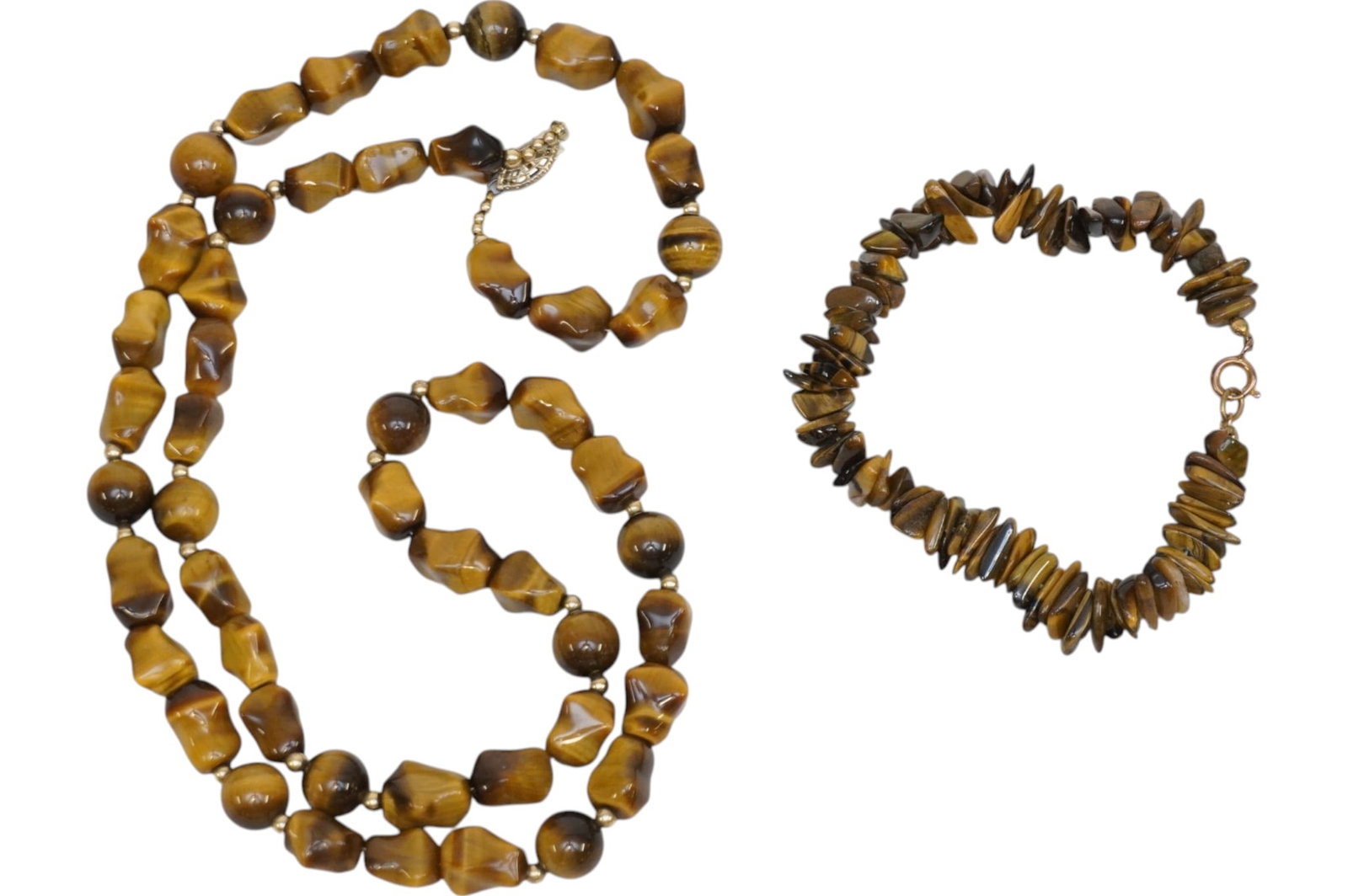2 PC VINTAGE TIGER EYE NECKLACE AND BRACELET: Vintage 1970s Tigers Eye Necklace measures 26" opened and Bracelet 8" opened. Weight 3.2 oz. . **In house shipping available on this lot** If you win this lot, please select self arranged for in house