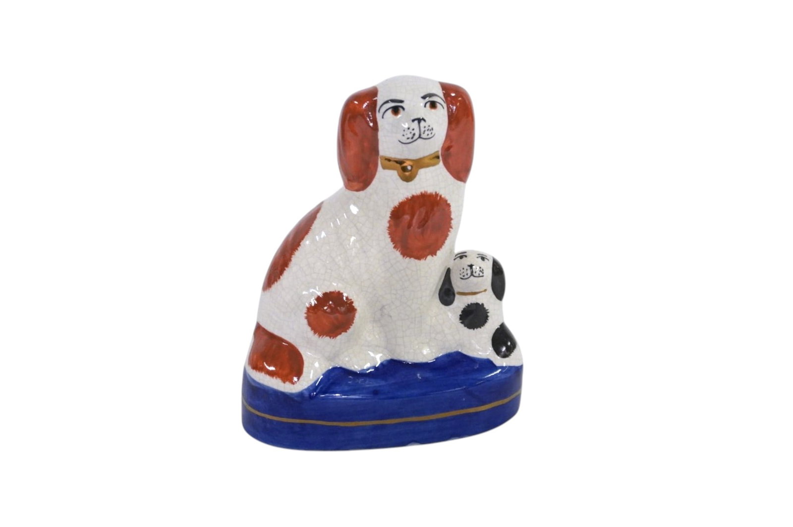 ENGLISH STAFFORDSHIRE SPANIEL WITH PUP: Vintage Staffordshire Spaniel with Puppy. Marked on base. Measures 5"x2 1/4"x6". Weight 12 oz **In house shipping available on this lot** If you win this lot, please select self arranged for in house 