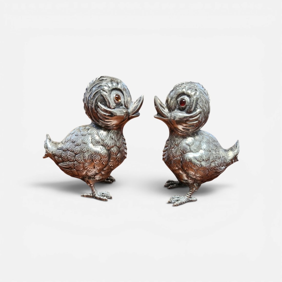 SPANISH SILVER SALT & PEPPER SHAKERS CHICKS 1940s: Vintage 1940s Spanish Silver Salt and Pepper Shakers in the Shape of Chicks with Jeweled Eyes. Provenance: Madrid, Spain. Each 3 1/4". Weight 2.9 oz. **In house shipping available on this lot** If you