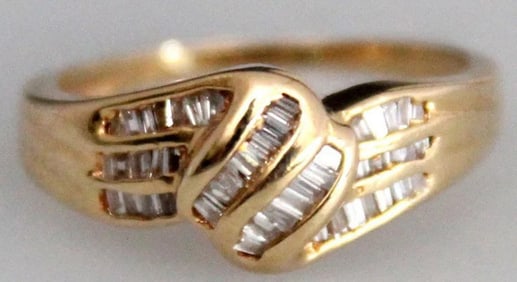 ESTATE 14k GOLD AND CHANNEL SET BAGUETTE DIAMOND RING