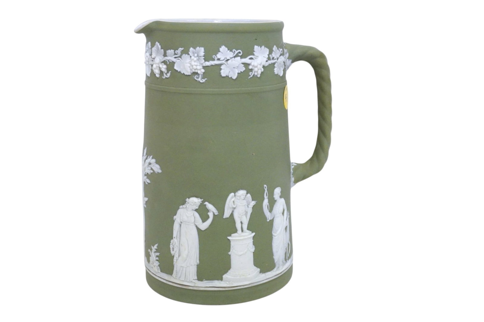 WEDGWOOD JASPERWARE SAGE PITCHER: Wedgwood Jasperware Sage Pitcher. Measures approx. 8.5" x 6" x 5" and weighs 2 lbs 15 oz. **In house shipping available on this lot** If you win this lot, please select self arranged for in house ship