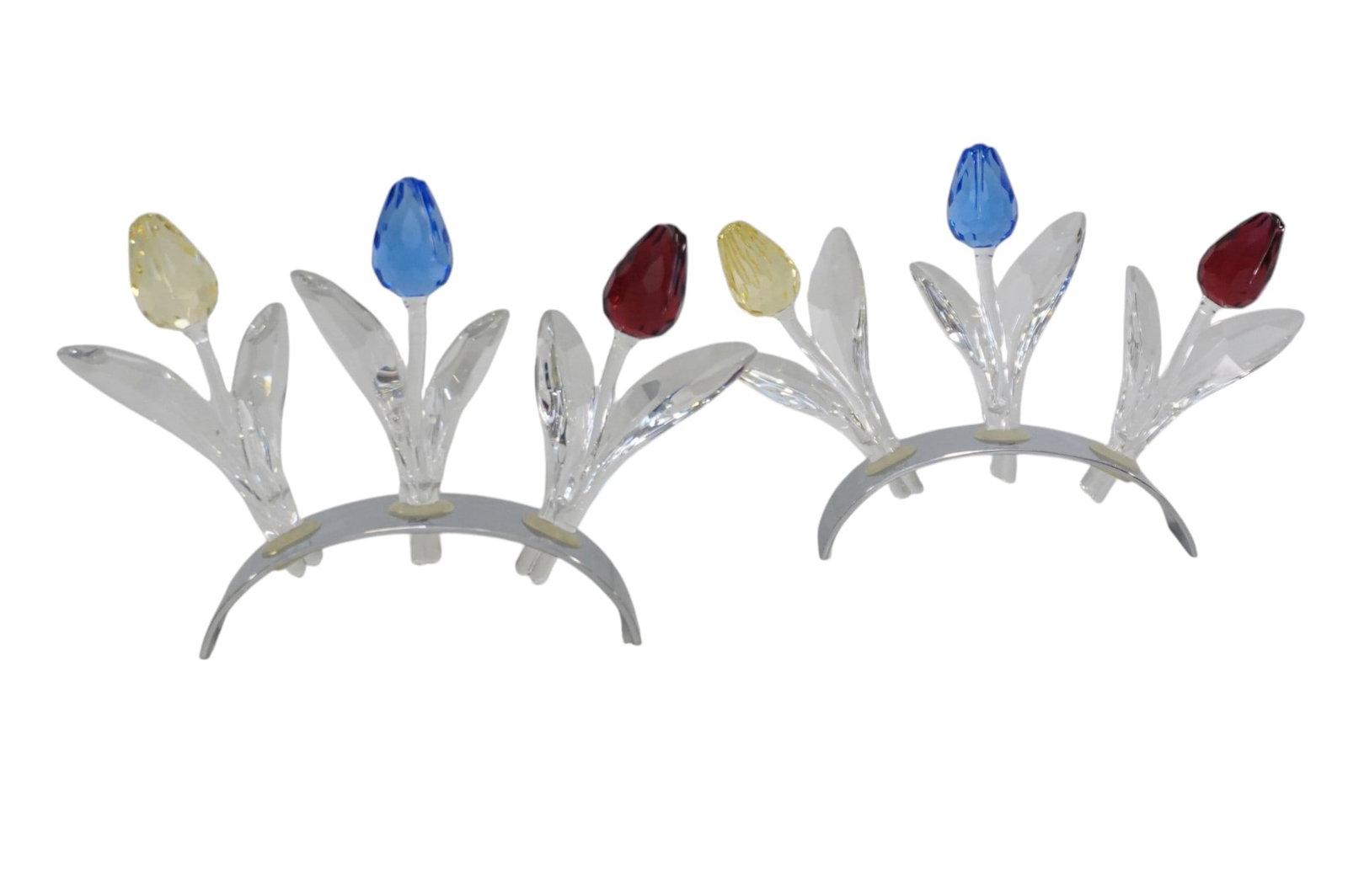 SWAROVSKI CRYSTAL TULIP FIGURINES W/ STAND SCS RENEWAL GIFT - TWO SETS: Two complete set of Swarovski Crystal Society SCS annual renewal gifts from 2002 to 2004 featuring three tulip figurines and the coordinating display stand. Includes the 2002 Tulip Blue model 606546,