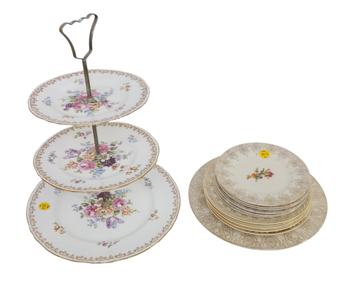 FLORAL PORCELAIN PLATES AND 3 TIERED SERVING TRAY 12 PIECES: 11 Vintage Porcelain Plates and 1 3 Tiered Serving Tray. Largest dish measures approx. 10" in dia and 3 tiered dish is 14" x 11" dia. and weighs 8 lbs 8 oz. **In house shipping available on this lot**