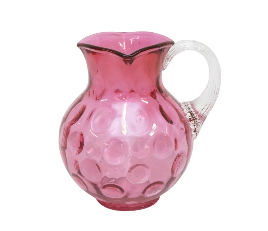 VINTAGE CRANBERRY COIN DOT PITCHER: Vintage Cranberry Coin Dot Pitcher with Applied Ribbed Handle. Measures 6"x5"x6 3/4'. Weight 1 lb 6 oz.