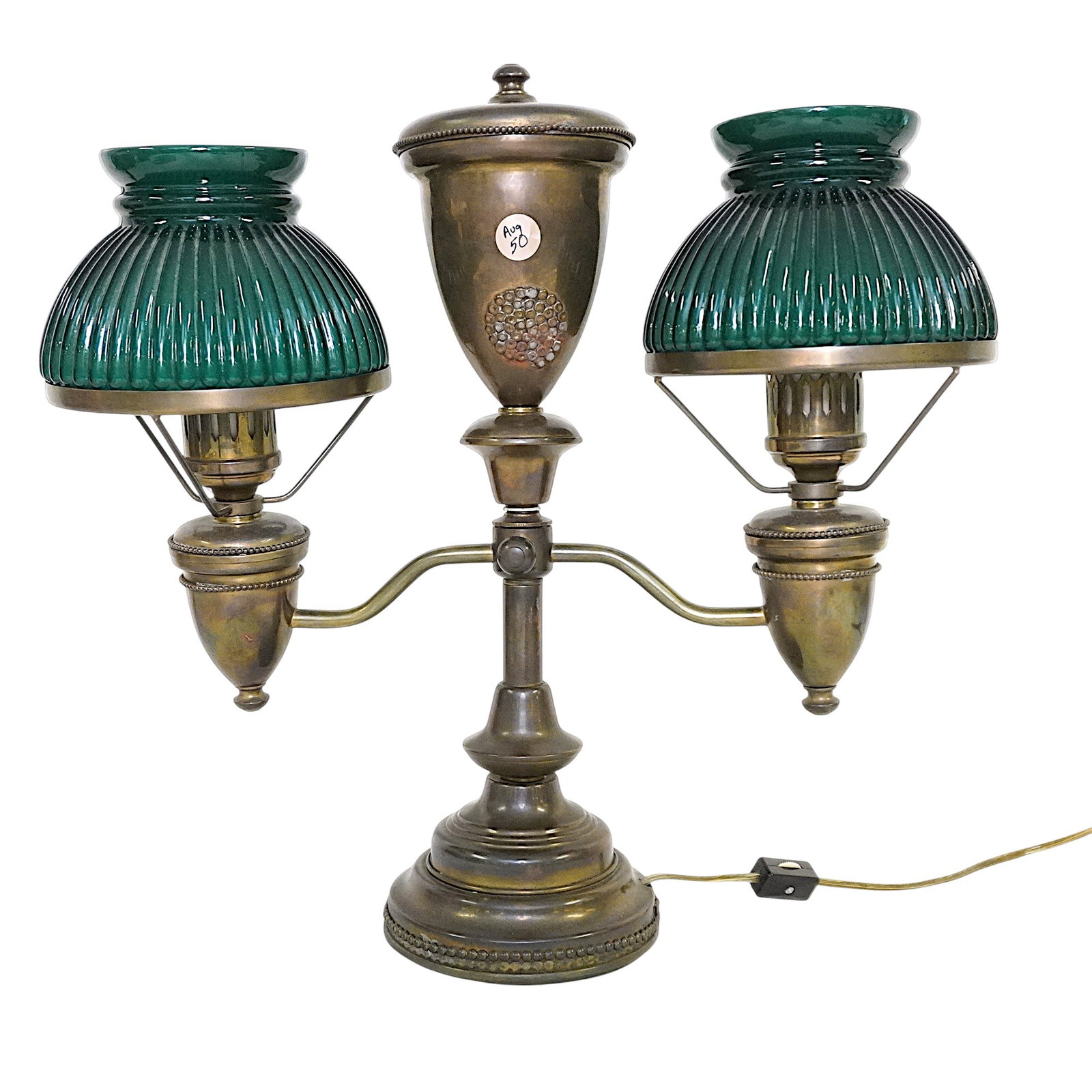ANTIQUE DOUBLE ARM BRASS STUDENT LAMP: Antique Brass Double Arm Student Lamp with Green Shades. Electrified. Possibly Bradley & Hubbard. Measures 16"x5 1/2"x15 1/4". Weight 8 lbs 9 oz. . **In house shipping available on this lot** If you w