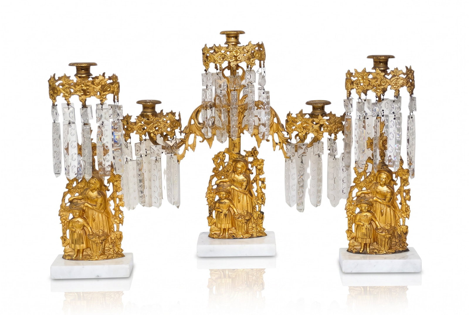 ANTIQUE GILDED GIRANDOLE CANDELABRA SET MOTHER & CHILD: Circa 1850-60 3 pc Set Gilded Brass Girandoles on white marble bases & cut glass prisms. Cast mother & child with flower basket. Purchased at Tucker Payne Antiques, Charleston. Center 17 1/2"x4"x17 1/