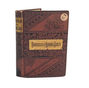 ANTIQUE EDITION OF THROUGH THE LOOKING GLASS BY LEWIS CARROLL