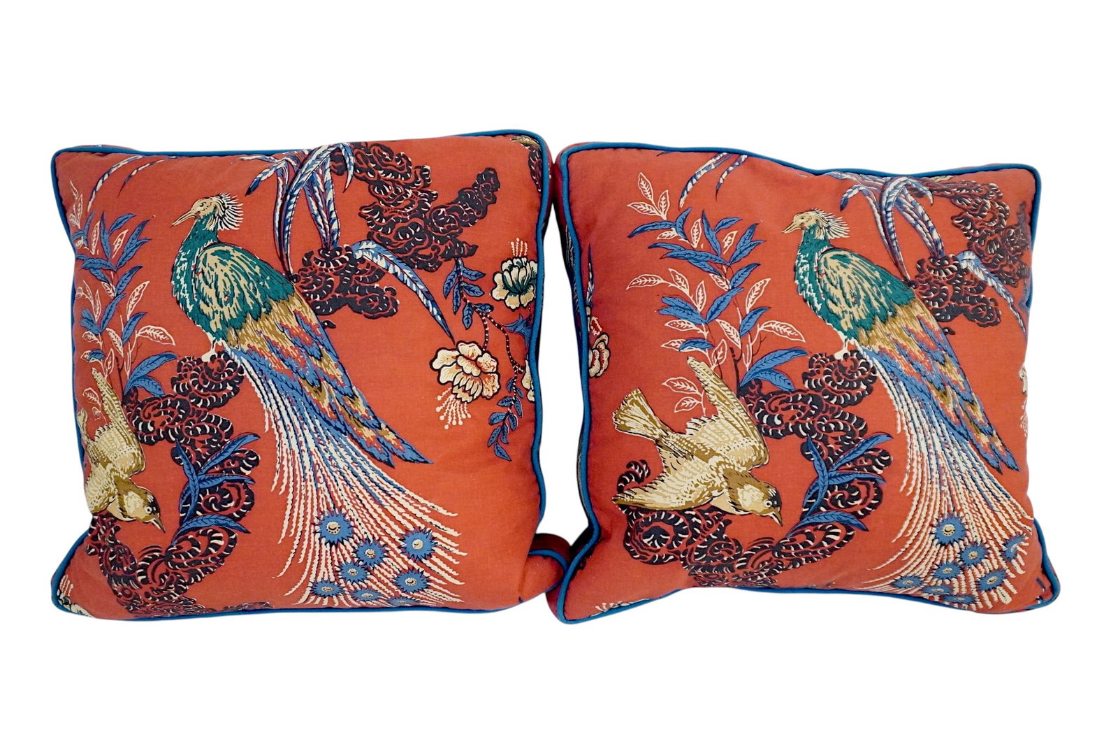 PAIR OF CUSTOM SCHUMACHER PEACOCK CHINOISERIE PILLOW COVERS: Pair of custom Miles Redd for Schumacher red "peacock" pattern covers with blue piping and down filled pillow inserts. Each measure 20" x 20". Combined weight approximately 2 pounds. **In house