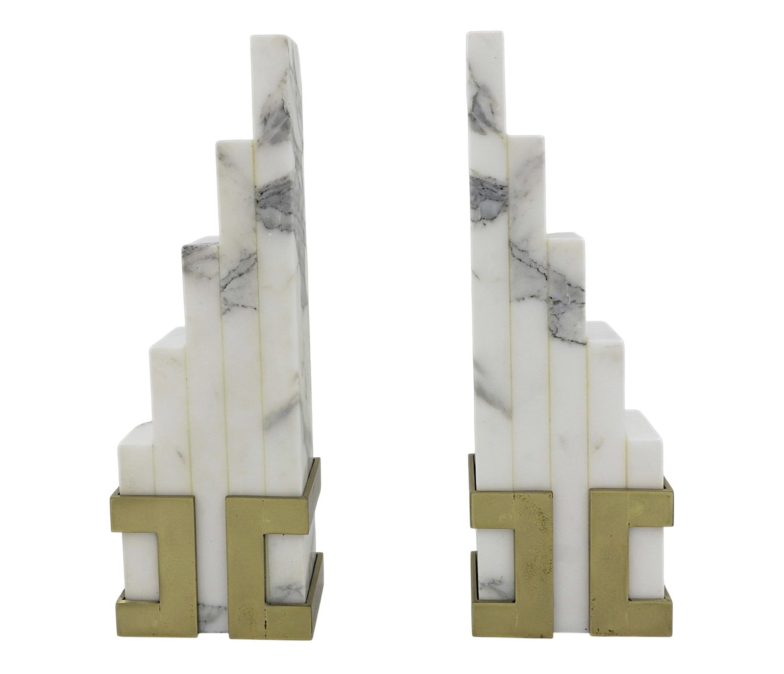 ART DECO STYLE ITALIAN CARRARA MARBLE BOOKENDS: Italian Art Deco Style Carrara Marble Skyscraper Bookends. Each 4"x2 1/4"x12". Weight combined 13 lbs 4 oz Provenance: A East Bay Street, Charleston SC Private Estate.**In house shipping available on