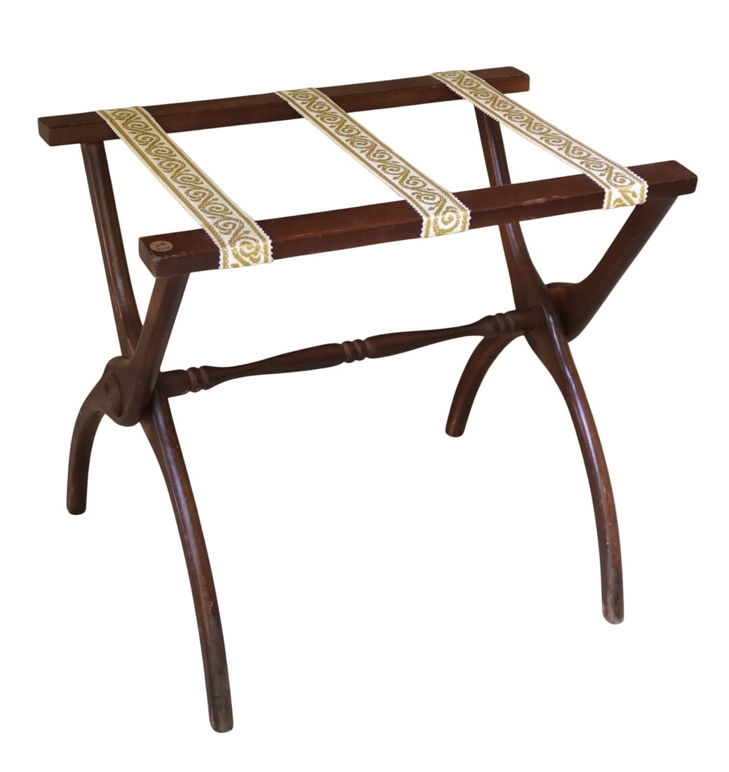 MID CENTURY FOLDING LUGGAGE RACK: Mid Century Wood Folding Luggage Rack with Jacquard tapestry ribbons.22"x4"x25" folded. Weight 4 lbs 8 oz **In house shipping available on this lot** If you win this lot, please select self arranged