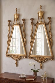 MATCHED PAIR OF CARVED ITALIAN TRIANGULAR MIRRORS