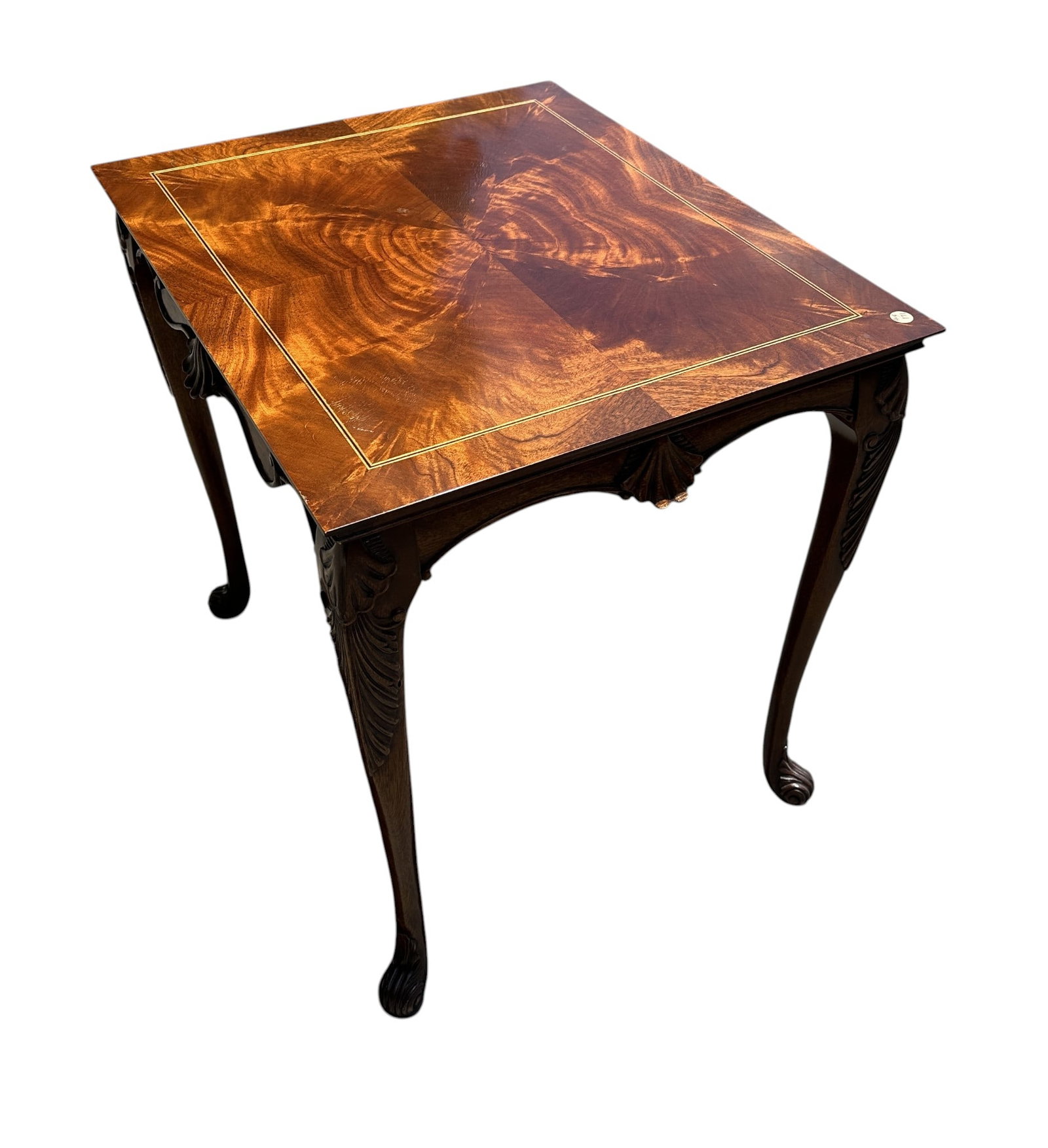 BOOKMATCHED FLAME MAHOGANY SIDE TABLE: 20th c Bookmatched Flame Mahogany Side Table. Measures 27"x22"x26". Provenance: A East Bay Street, Charleston SC Private Estate.**In house shipping available on this lot** If you win this lot, please