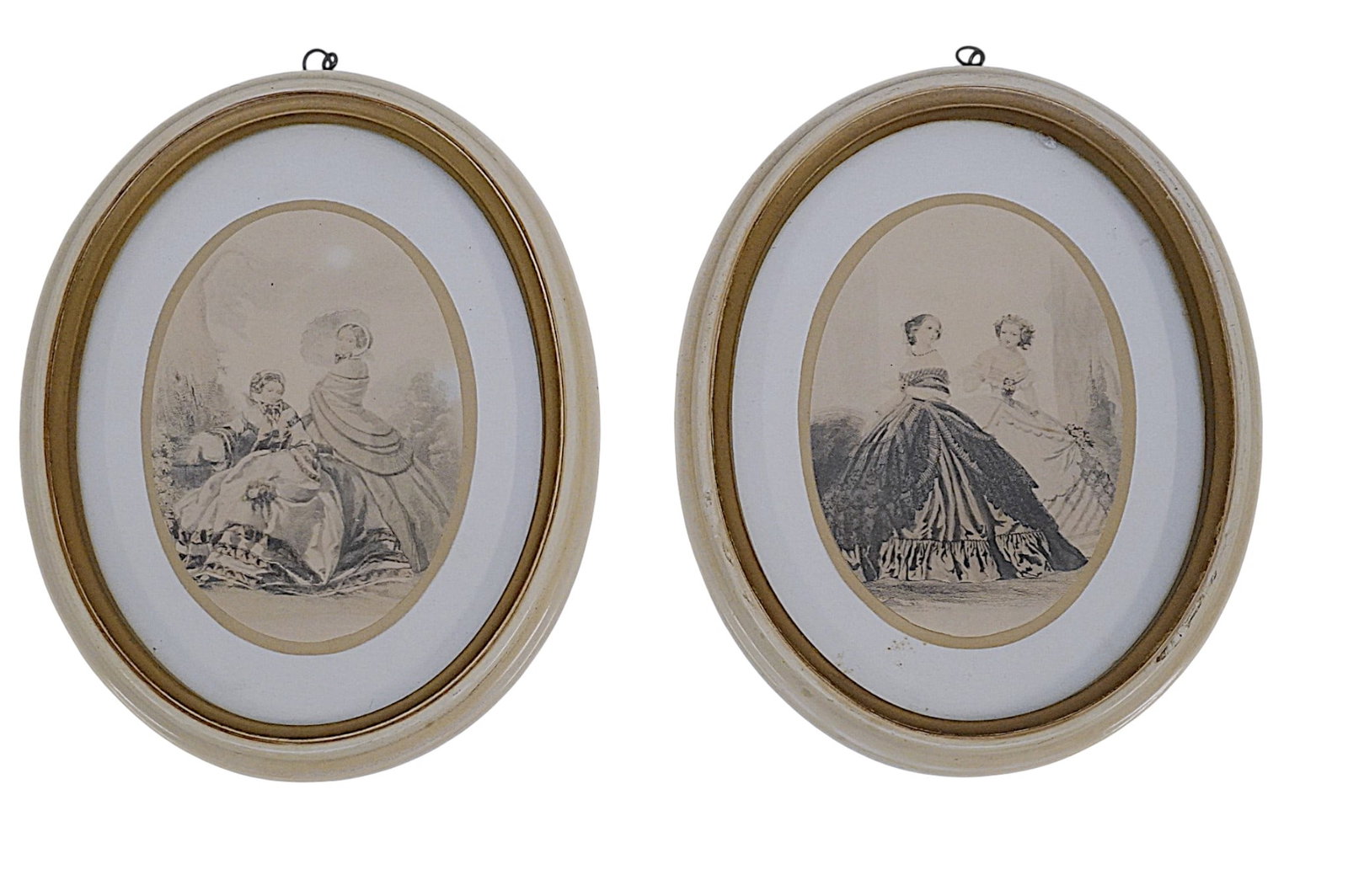 PAIR OF OVAL FRAMED ANTIQUE LADIES FASHION PRINTS: Pair of Oval Framed Antique Ladies Fashion Prints. Each measures approx. 8.5" x 6.75" and total lot weight is 1 lb 1.5 oz. Provenance: A Washington DC Private Estate **In house shipping available on t