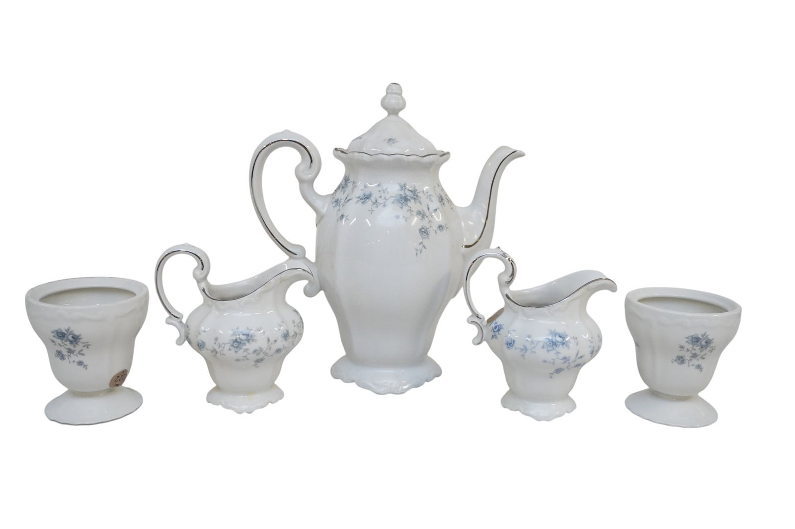 5 HAVILAND BLUE GARLAND CHINA PIECES - TEAPOT, CREAMERS, AND CANDLESTICKS: 5 Haviland Blue Garland China Pieces. This lot includes teapot, creamers, and candlesticks. Largest teapot measures approx. 10.5" x 9" x 5" and total lot weight is 4 lbs 10 oz. **In house shipping