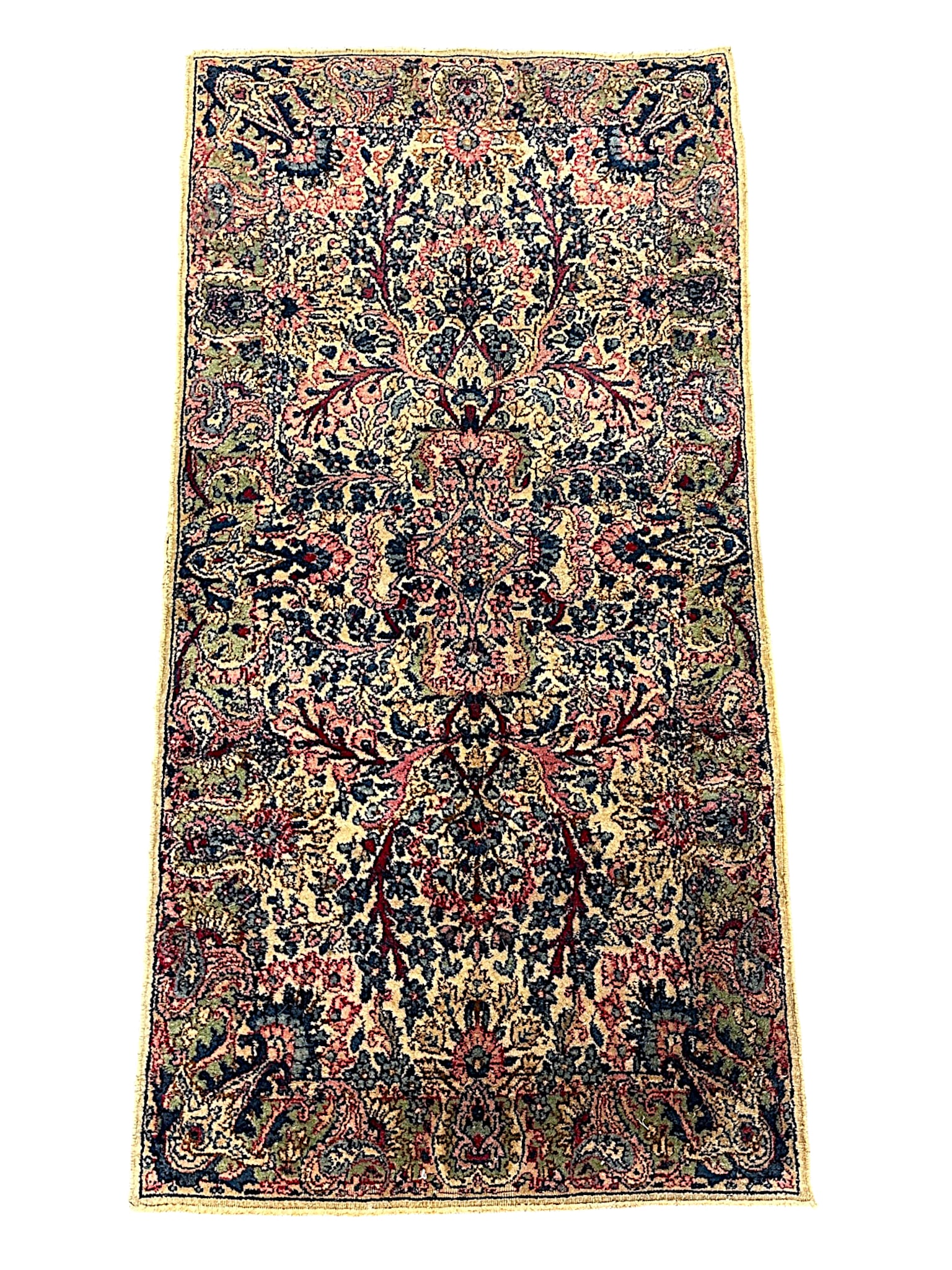 HAND KNOTTED LAVAR KERMAN RUG: Early 20th c Hand Knotted Lavar Kerman Rug with a intricate all over dense floral and botanical motif measures 24" x 47.5" Provenance: A Washington DC Private Estate **In house shipping available on t