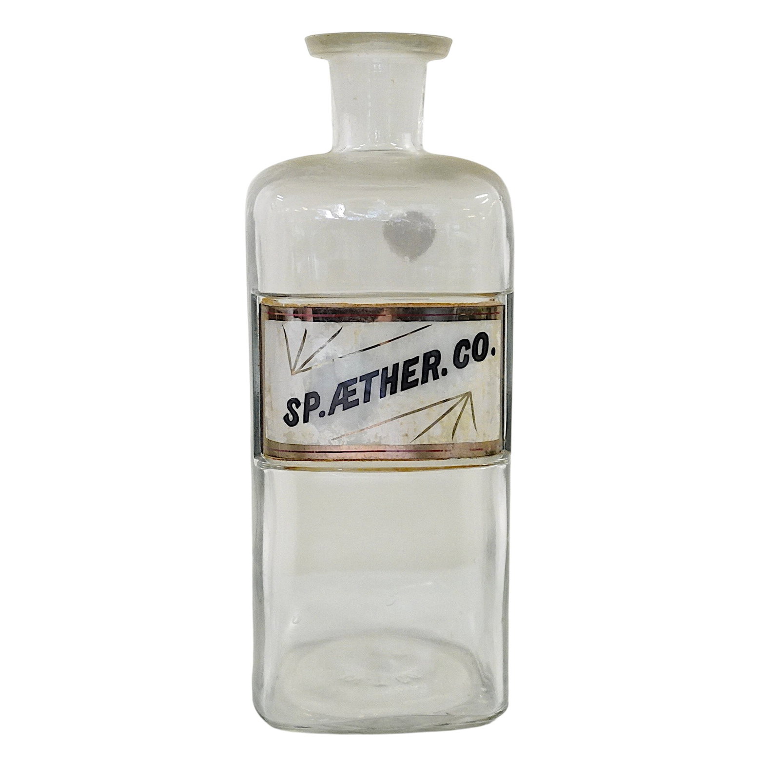 ANTIQUE APOTHECARY ETHER LABEL UNDER GLASS BOTTLE: Antique Apothecary Ether Label Under Glass Bottle. Measures approx. 9" x 3" x 3" and weighs 1 lb 6 oz. **In house shipping available on this lot** If you win this lot, please select self arranged for 