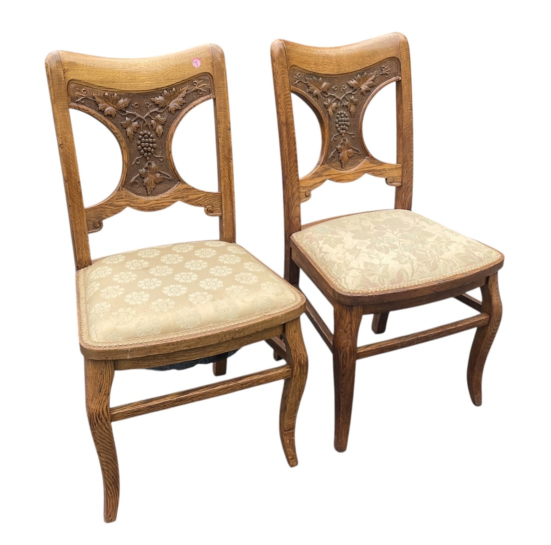 MATCHED PAIR ANTIQUE OAK CARVED GRAPE & VINE CHAIRS: Matched Pair of Antique Oak Carved Grape & Vine Side Chairs with Brocade uphostered seats. Each 17 1/2"x19 1/2"x36 1/4" tall.Provenance: A Washington DC Private Estate. **In house shipping available o