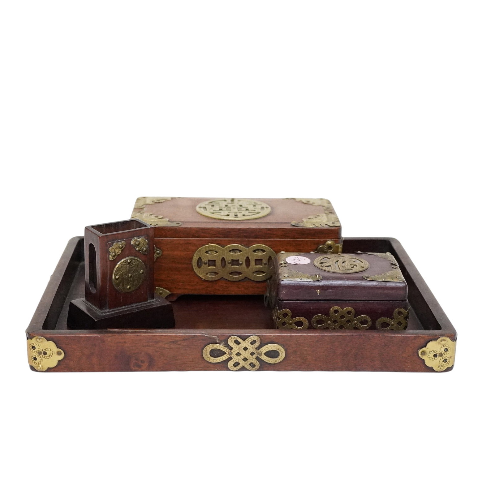 4 PC SET CHINESE ROSEWOOD & BRASS DESK ACCESSORIES: 4 Vintage Chinese rosewood, teak & brass Items for desk. Includes Tray 9.25"x12.25"x1.50". Box 7"x3 1/2"x2 1/2". Box 3.75"x2.50"x2". Matchbox Stand 2.75"x1.75"x3.25". Weight on all 2 lbs 12 oz.