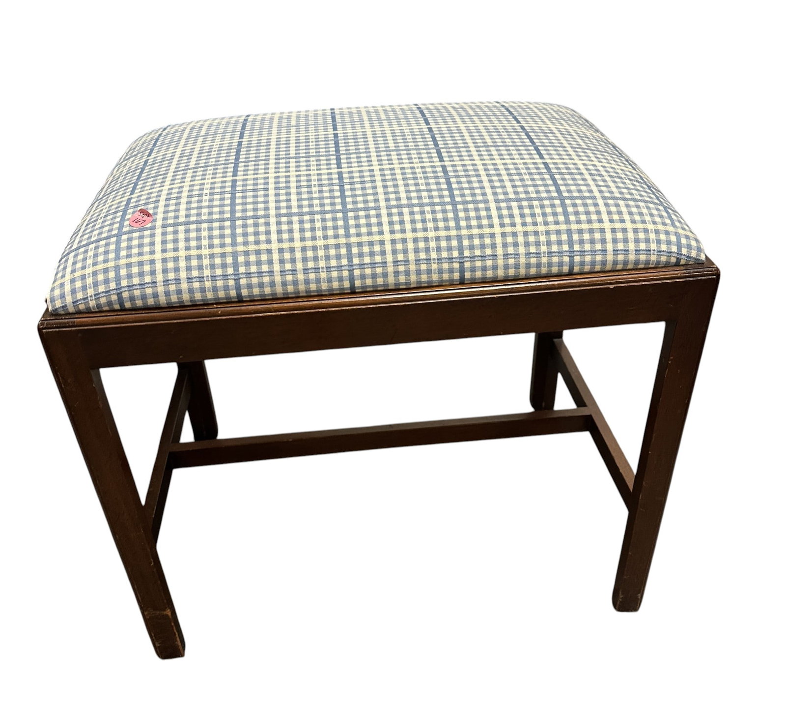 ANTIQUE MAHOGANY FOOTSTOOL / VANITY BENCH: Anique Mahogany Footstool / Vanity Bench. Upholsterd in a blue and white grid pattern fabric. Measures 18"x15"x21". Provenance:16 Water Street, a beautifully appointed home, circa 1815, located in