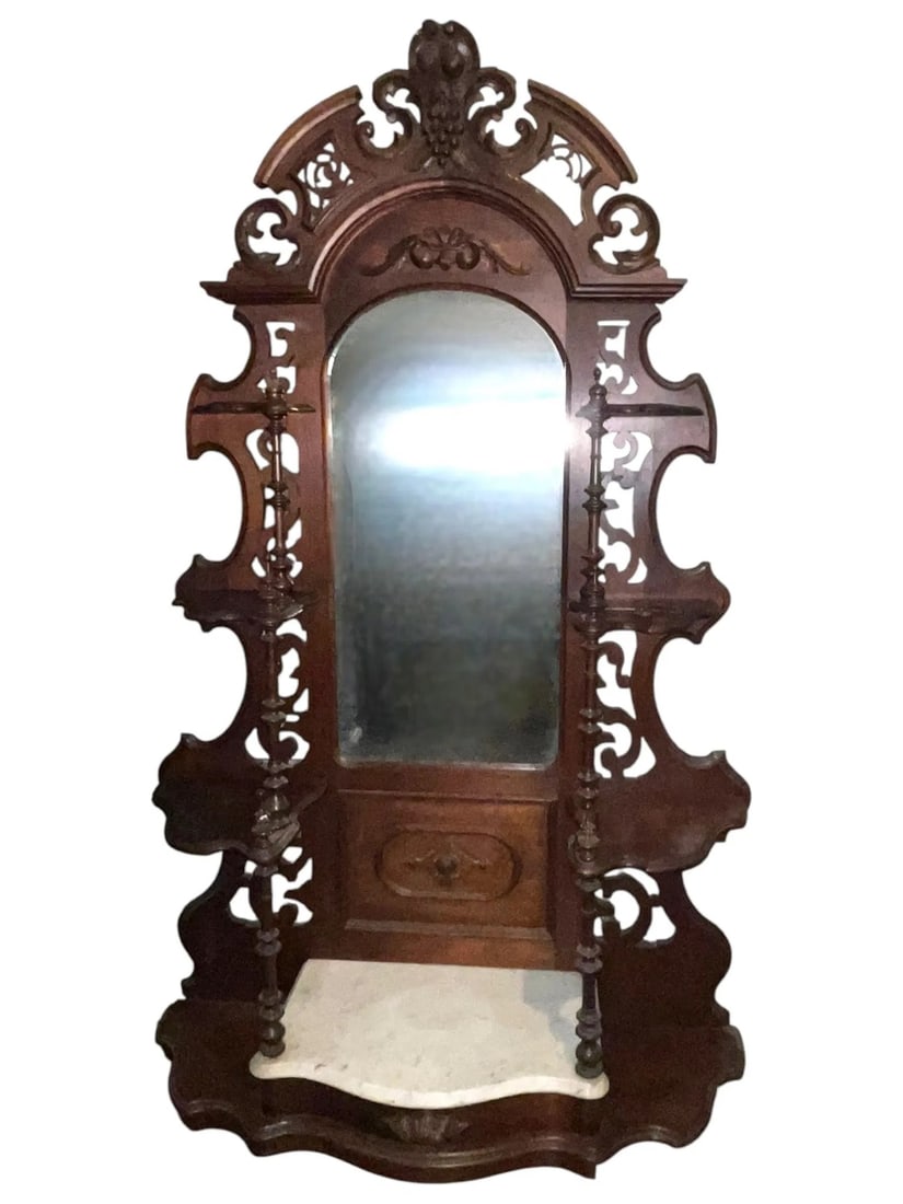 19th c LARGE CARVED ETAGERE WITH MIRROR & MARBLE BASE: Large Ornate Carved Etagere with Mirror and Marble Base. Carved cornice, 8 shelves. Measures 84" x 51.5" x 16" PROVENANCE:The Historic 1798 John Burckmeyer House, 120 Wentworth Street, Charleston SC