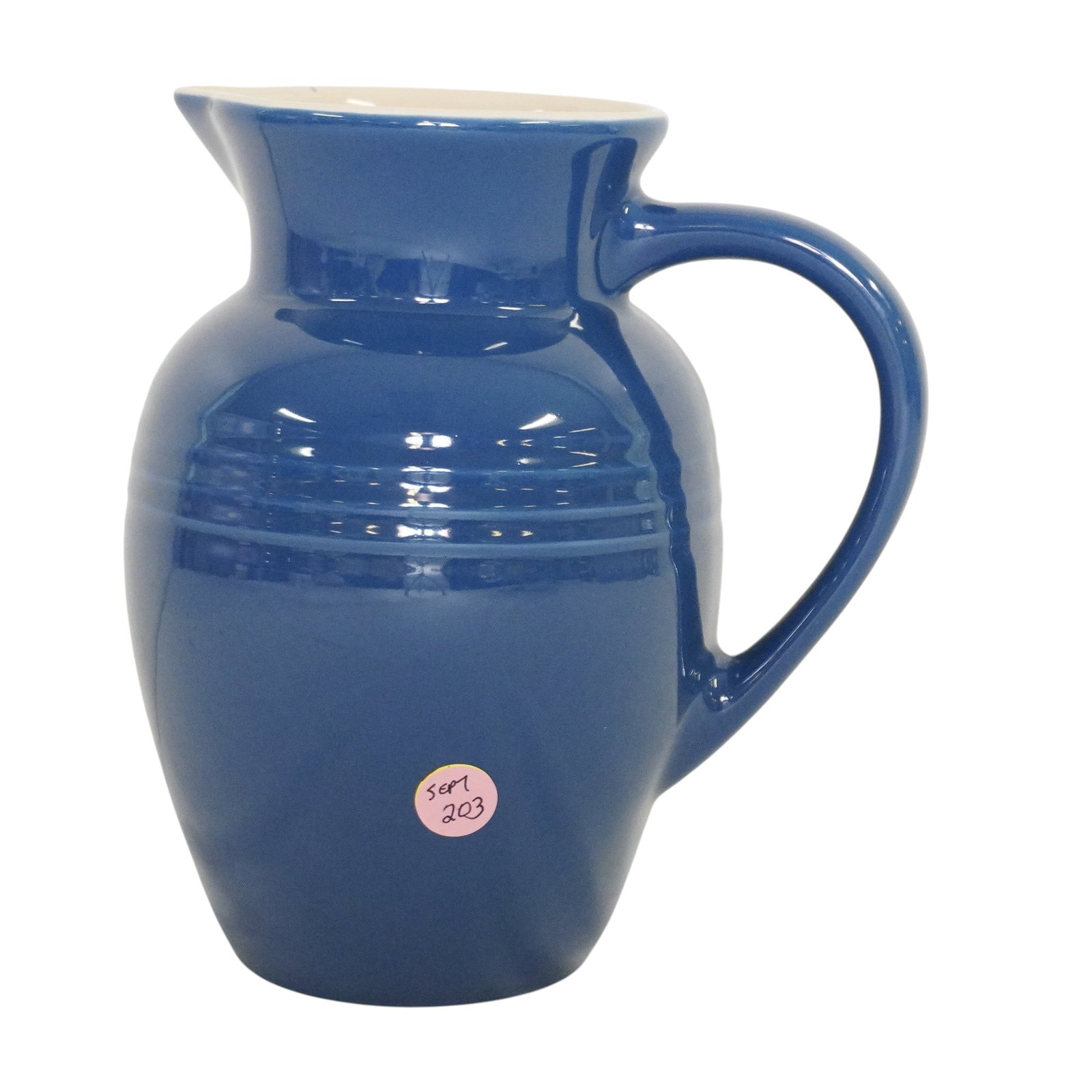 LE CRUESET INDIGO PITCHER 72 OZ: 72 Oz Pitcher in the Indigo (Cobalt) pattern by Le Creuset. Measures 8 5/8". Weight 3 lbs 5 oz. PROVENANCE The Historic R.M. Venning House, Charleston SC **In house shipping available on this lot**
