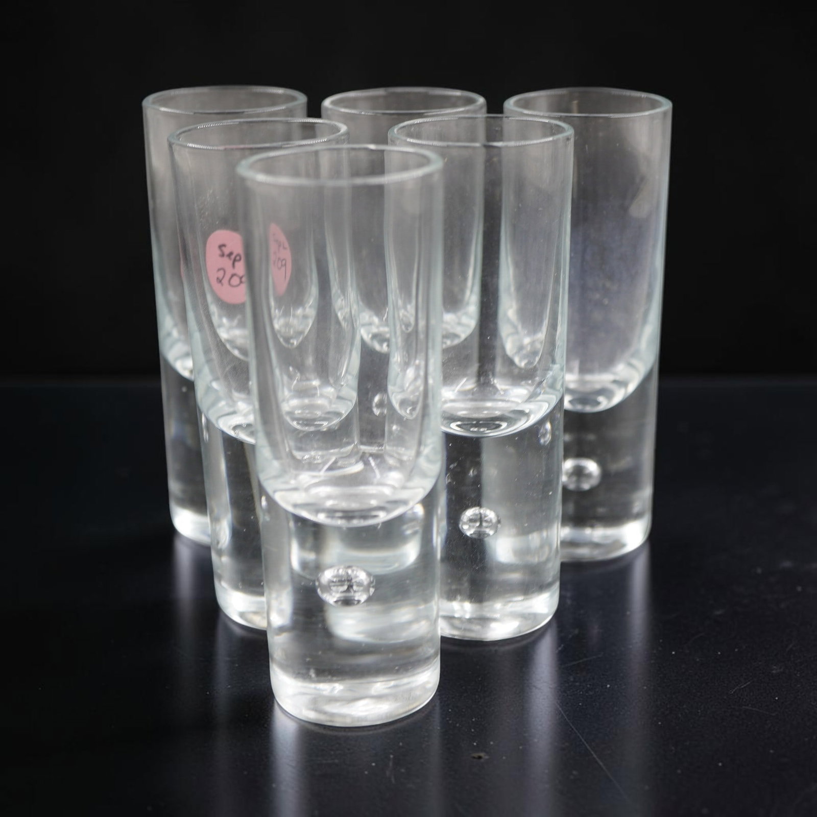 6 KOSTA BODA PIPPI SHERRY GLASSES: 6 Vintage Kosta Boda Sherry Glasses. Air Bubble in base. Each 4 3/4". Weight on all 2 lbs 4 oz. Provenance:16 Water Street, a beautifully appointed home, circa 1815, located in the heart of the