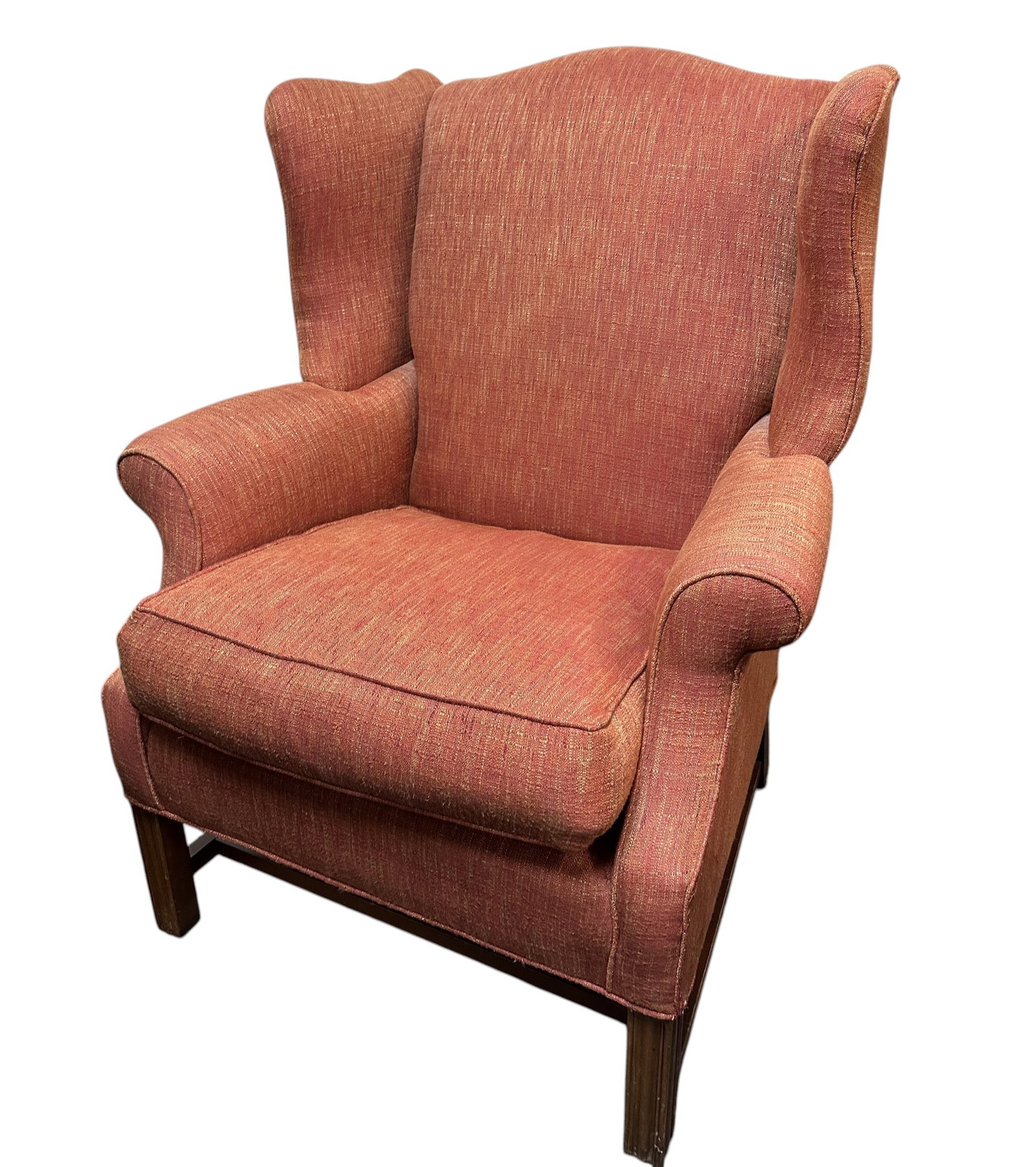 ANTIQUE TRADITIONAL QUEEN ANNE WINGBACK CHAIR: Antique Queen Anne Traditional Wingback Armchair with rolled arms and fluted wood legs, upholstered in a textured terracotta colored fabric. Measures 32"x32"x42". high. Provenance:16 Water Street, a