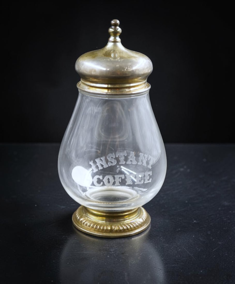 FRANK M. WHITING & CO. STERLING AND ETCHED GLASS INSTANT COFFEE JAR: Frank M. Whiting & Co. Sterling and Etched Glass Instant Coffee Jar. Measures approx. 5" x 3" in dia. and weighs 5 oz.