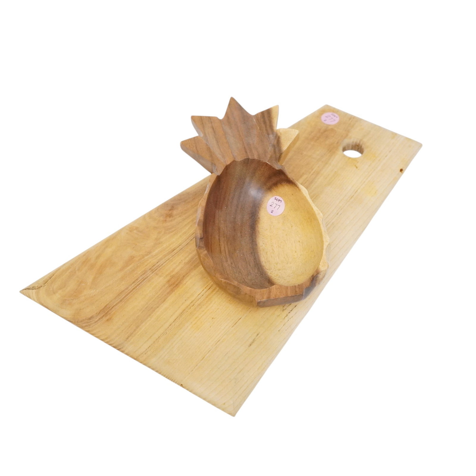2 PIECES OF VINTAGE TEAK/BAMBOO SERVING WARE: 2 pieces of vintage teak/bamboo serving ware. Includes charcuterie board and pineapple nut dish. Largest piece is board which measures approx. 15" x 9", total lot weight is 2 lb 4.6 oz. Provenance:16 