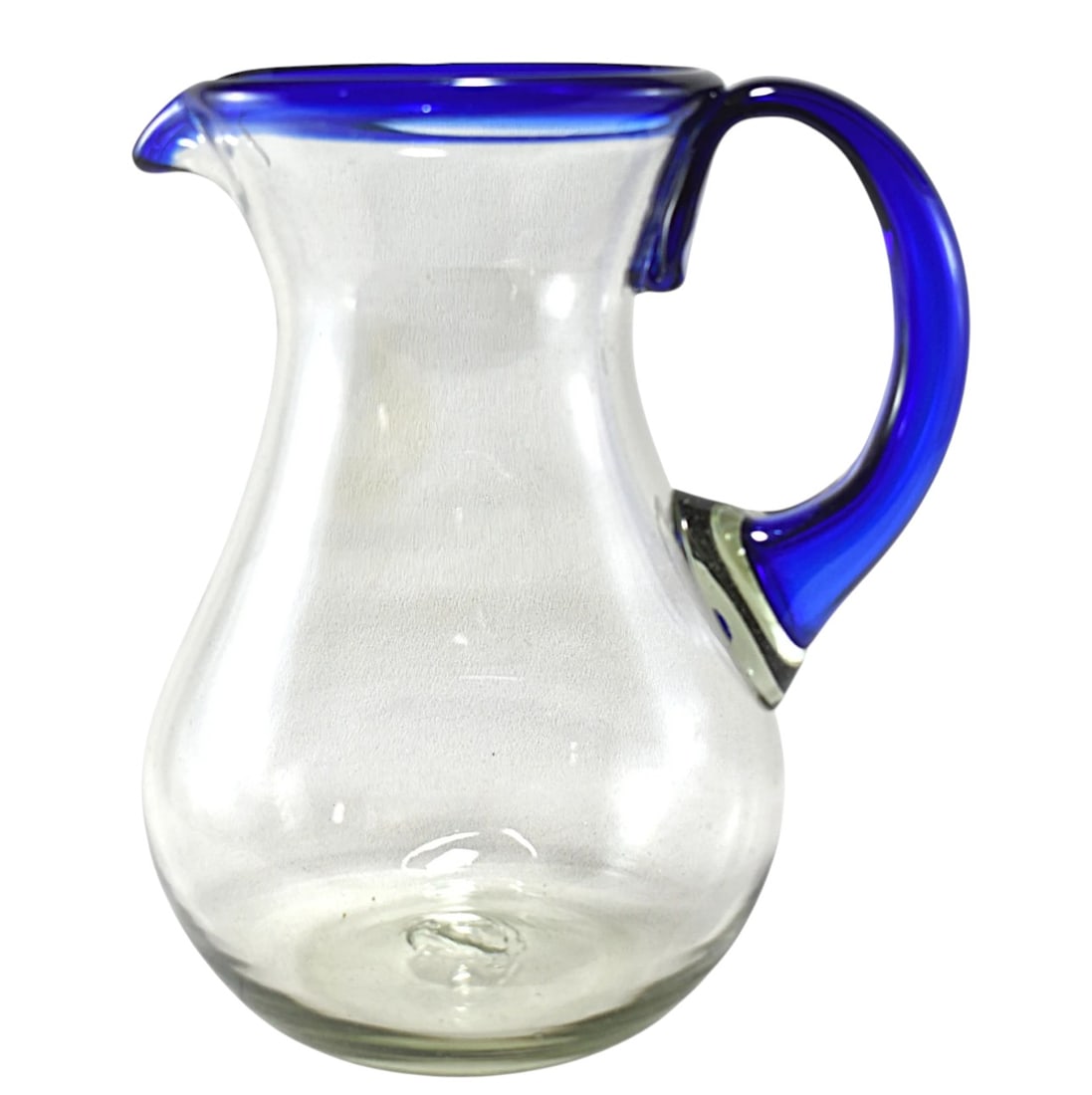 VINTAGE MEXICAN HAND BLOWN COBALT & CLEAR PITCHER: Vintage Mexican Hand Blown Cobalt & Clear Pitcher. Perfect for margaritas. Measures 7 1/2"x56"x8 3/4". Weight 2 lbs 11 oz. Provenance:16 Water Street, a beautifully appointed home, circa 1815, located