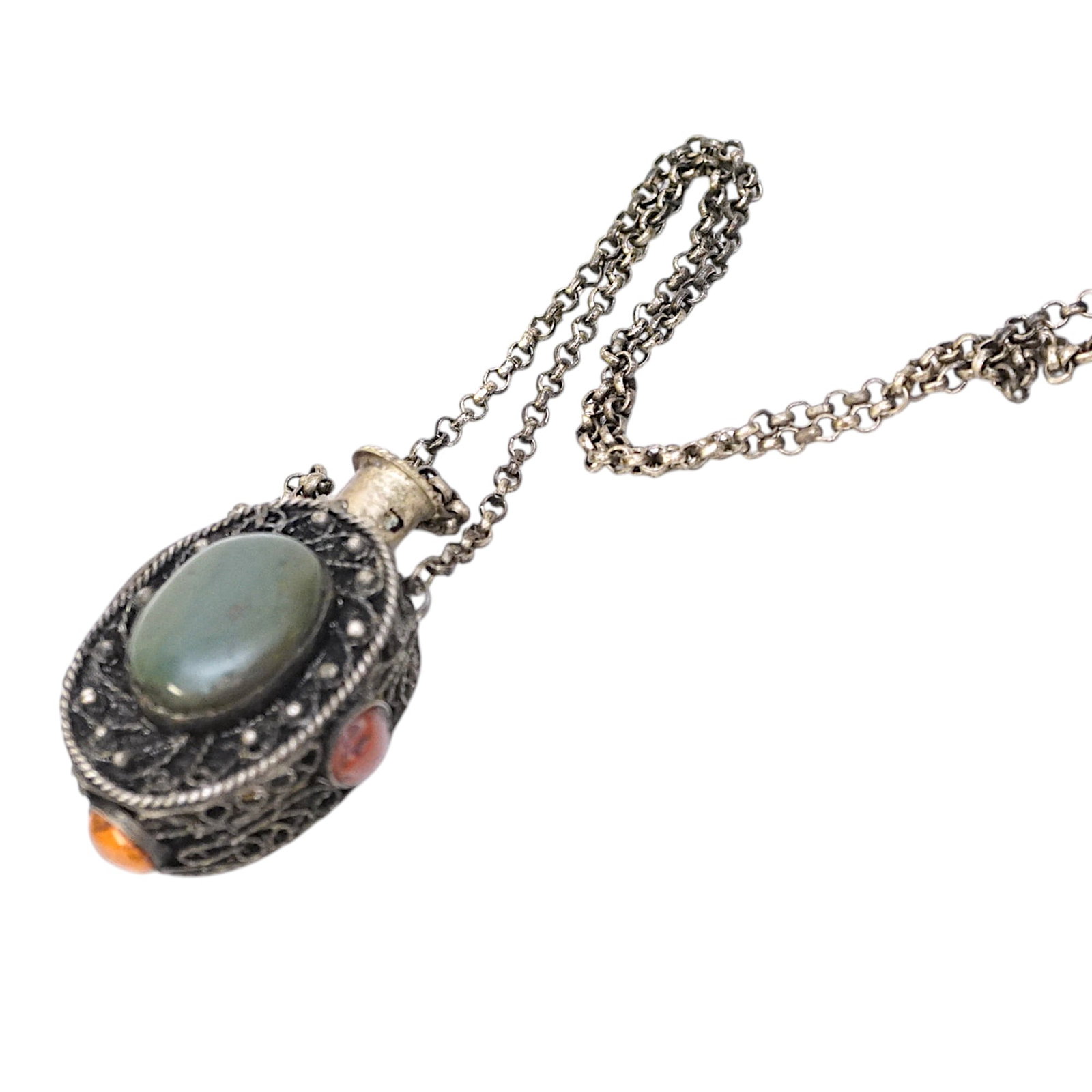 VINTAGE ORNATE TIBETAN SNUFF BOTTLE CHALCEDONY SNUFF: Vintage Ornate Tibetan Snuff Bottle with chalcedony & coral necklace.On chain 15" Just snuff 2 1/2". Weight 2 oz. **In house shipping available on this lot** If you win this lot, please select self ar