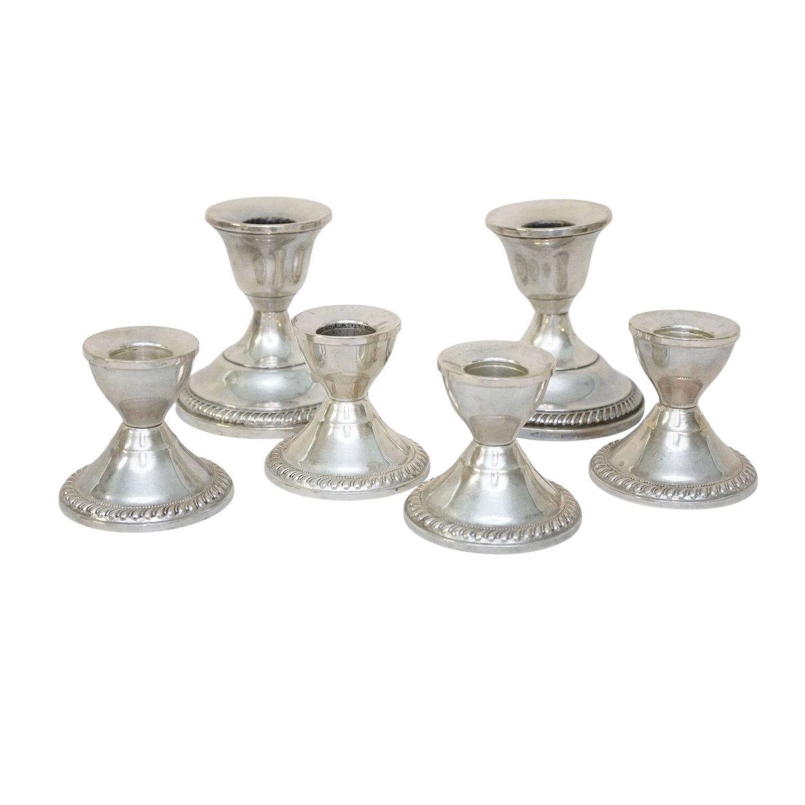 6 VINTAGE STERLING SILVER WEIGHTED CANDLESTICKS: 6 Sterling Silver Weighted Candlesticks. 2 Larger 3 1/2". 4 Matching 2 1/2". Weight on all 2 lbs. **In house shipping available on this lot** If you win this lot, please select self arranged for in ho