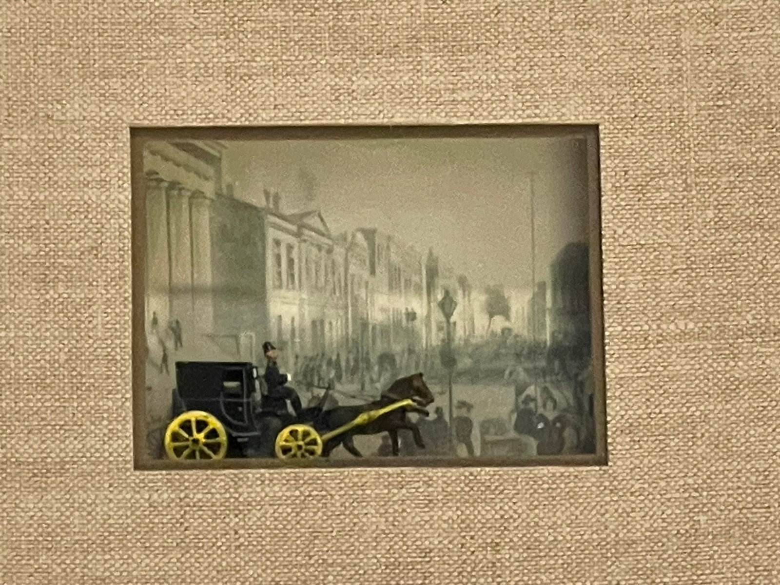 WALL STREET FROM THE CORNER OF BROAD NYC DIORAMA: Wall Street from the corner of Broad NYC with a "Fiacre" horse drawn Carriage. In frame measures 11"x9"x2". Weight 1 lb Provenance:16 Water Street, a beautifully appointed home, circa 1815, located in