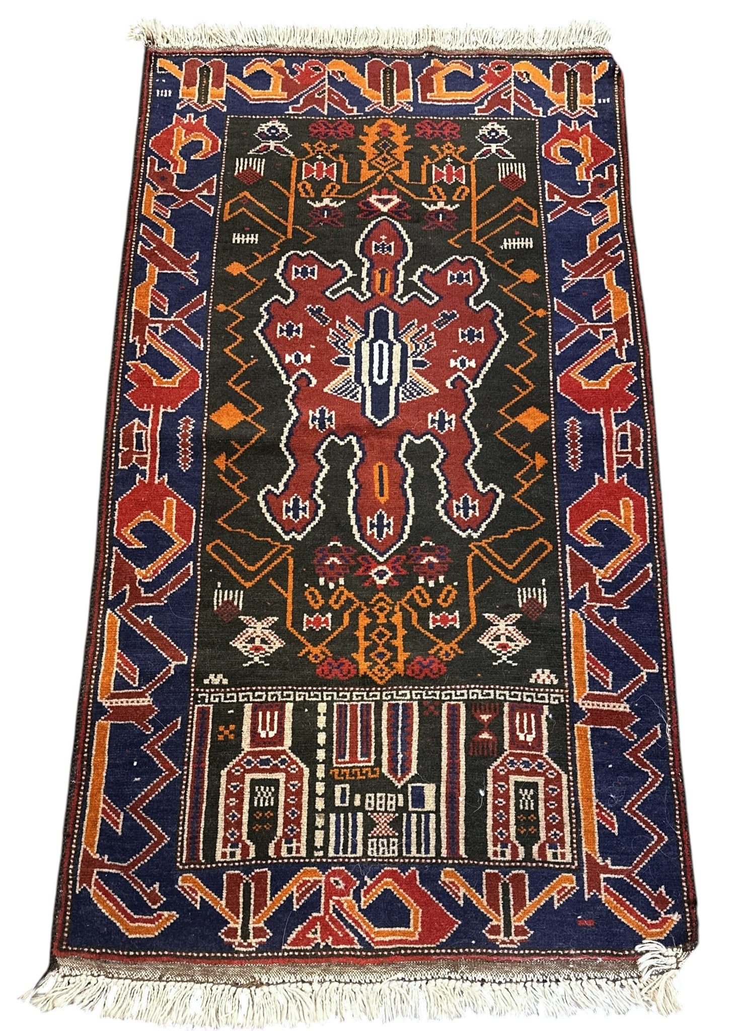 VINTAGE HAND KNOTTED AFGHAN BALUCH WOOL RUG: Vintage Hand Knotted Afghan Tribal Baluchi Wool Rug. Measures 60"x33". Weight 6 lbs **In house shipping available on this lot** If you win this lot, please select self arranged for in house shipping w