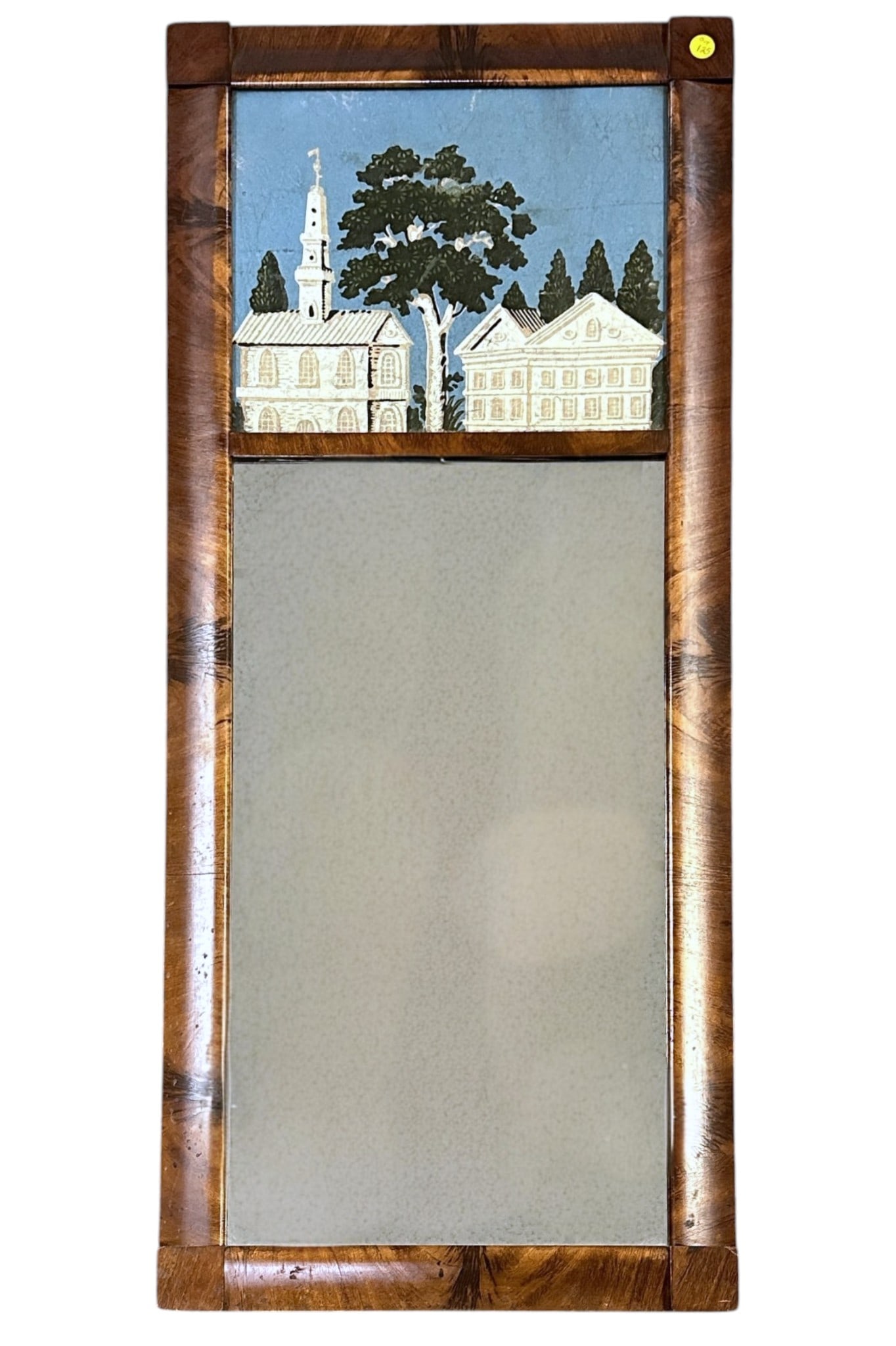 19th c FLAME MAHOGANY EGLOMISE TRUMEAU MIRROR: 19th c Flame Mahogany Trumeau Mirror with eglomise painting of a church and meeting house. Measures 18"x42"x1". Weight 9 lbs. Provenance:16 Water Street, a beautifully appointed home, circa 1815, loca