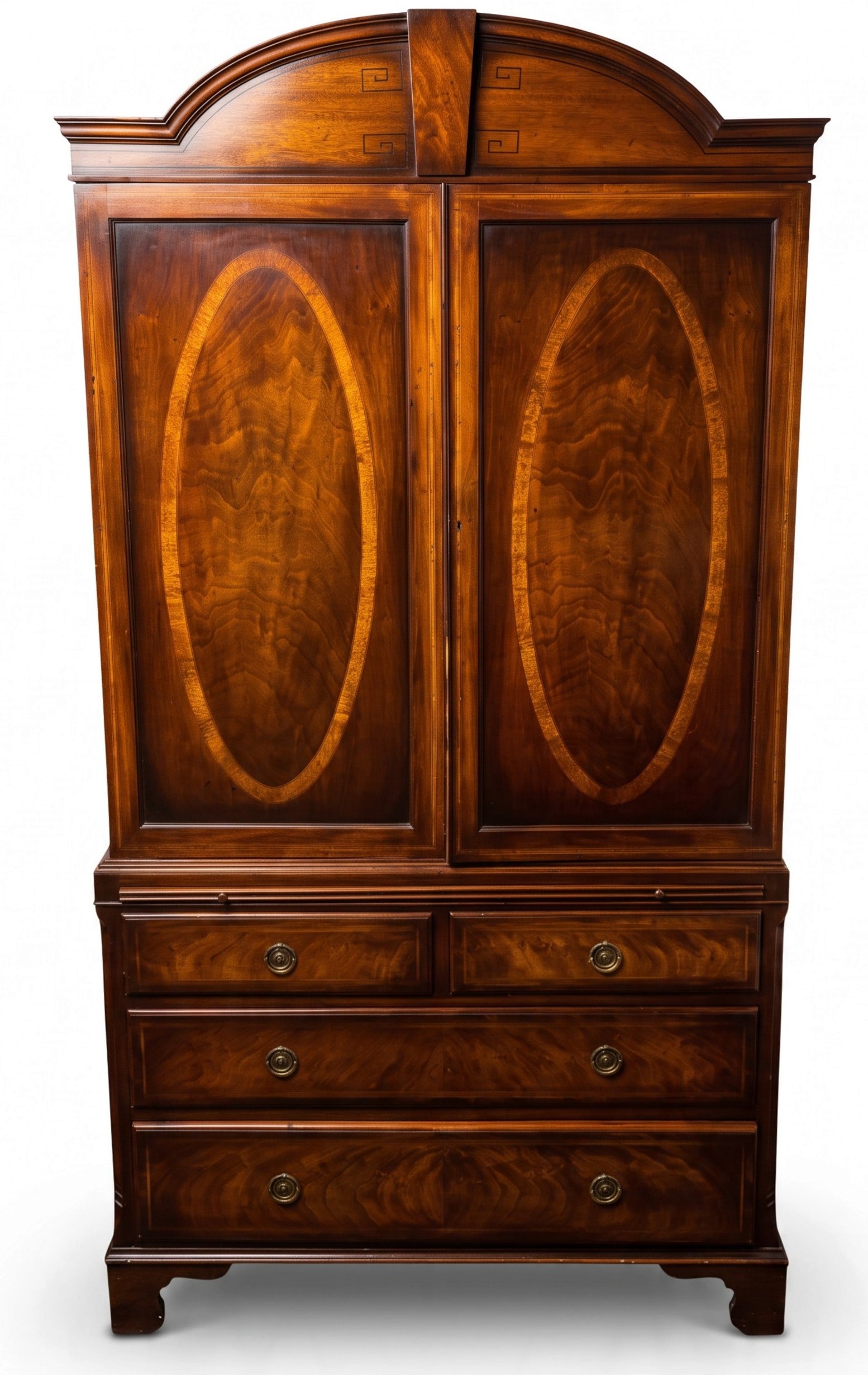 GEORGE III MAHOGANY LINEN PRESS: George III style Linen Press featuring prominent oval flame mahogany inlays on the wood inlaid panel doors and a arched top crest. Lower portion with 4 drawers (2 short ovr=er 2 long) and a pull out s