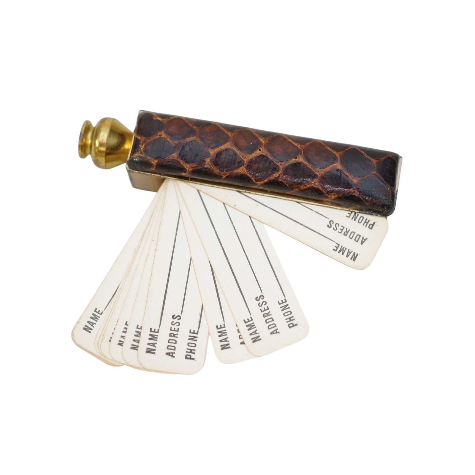 VINTAGE MINIATURE LEATHER AND BRASS ADDRESS BOOK: Vintage Miniature Leather and Brass Address Book. Weighs approx. 1 oz. Measures 3"x3/4"x1/2". **In house shipping available on this lot** If you win this lot, please select self arranged for in house 