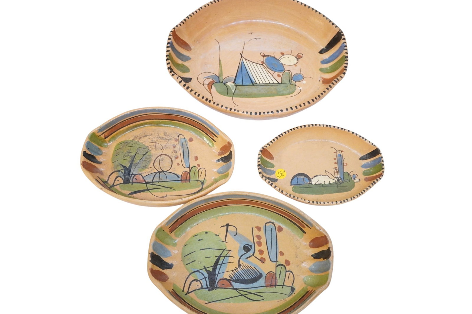 4 MID-CENTURY MEXICAN REDWARE NESTING POTTERY SERVING PLATTERS: Mid Century Mexican Redware Nesting Pottery Serving Platters. Set of 4. Largest measures approx. 13" x 10" x 2.5", total lot weight is 6 lbs. **In house shipping available on this lot** If you win thi