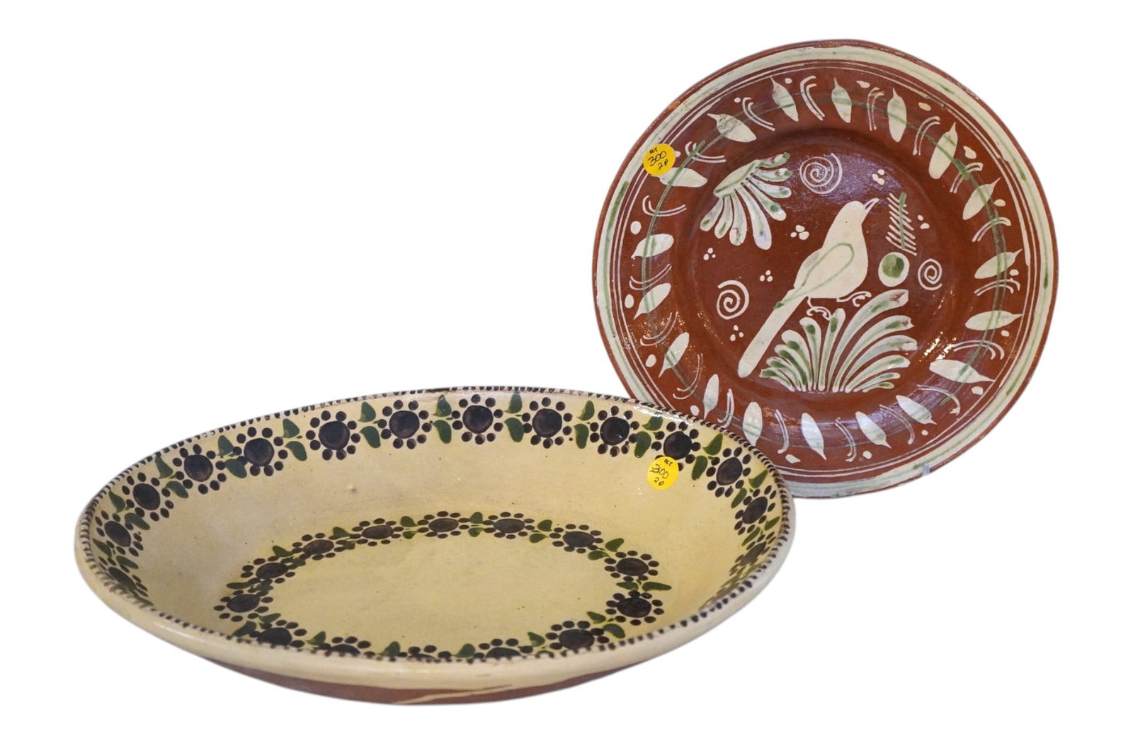 2 VINTAGE MEXICAN POTTERY HAND PAINTED SERVING BOWLS: Round Hand Painted Bird measures 10 1/2"x10 1/2"x1 1/2". Oval Hand Painted Florals measures 14"x11"X2 1/2". Weight combined 4 lbs 3 oz **In house shipping available on this lot** If you win this lot, 