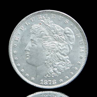 1878 Morgan Silver Dollar: Grade: Uncirculated - A chance to get the first year of issue of the very popular 1878 thru 1921 Morgan Silver Dollar series. This coin is struck in 90% fine silver and these first year issues are kno