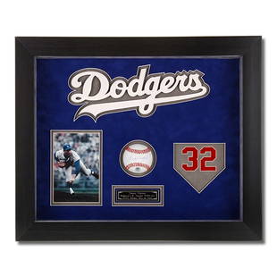 Sandy Koufax L.A Dodgers Signed Baseball Shadowbox: This is a beautifully designed Shadow 20x16 custom framed and original Sandy Koufax Autographed picture. This piece comes with a Certificate of Authenticity attached to the back.