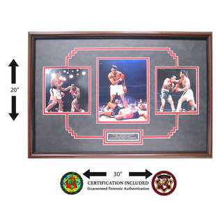 Muhammad Ali Signed Heavyweight Champion: This is a beautifully designed 30x20 custom framed and original Muhammad Ali Autographed picture. This piece comes with a Certificate of Authenticity attached to the back.