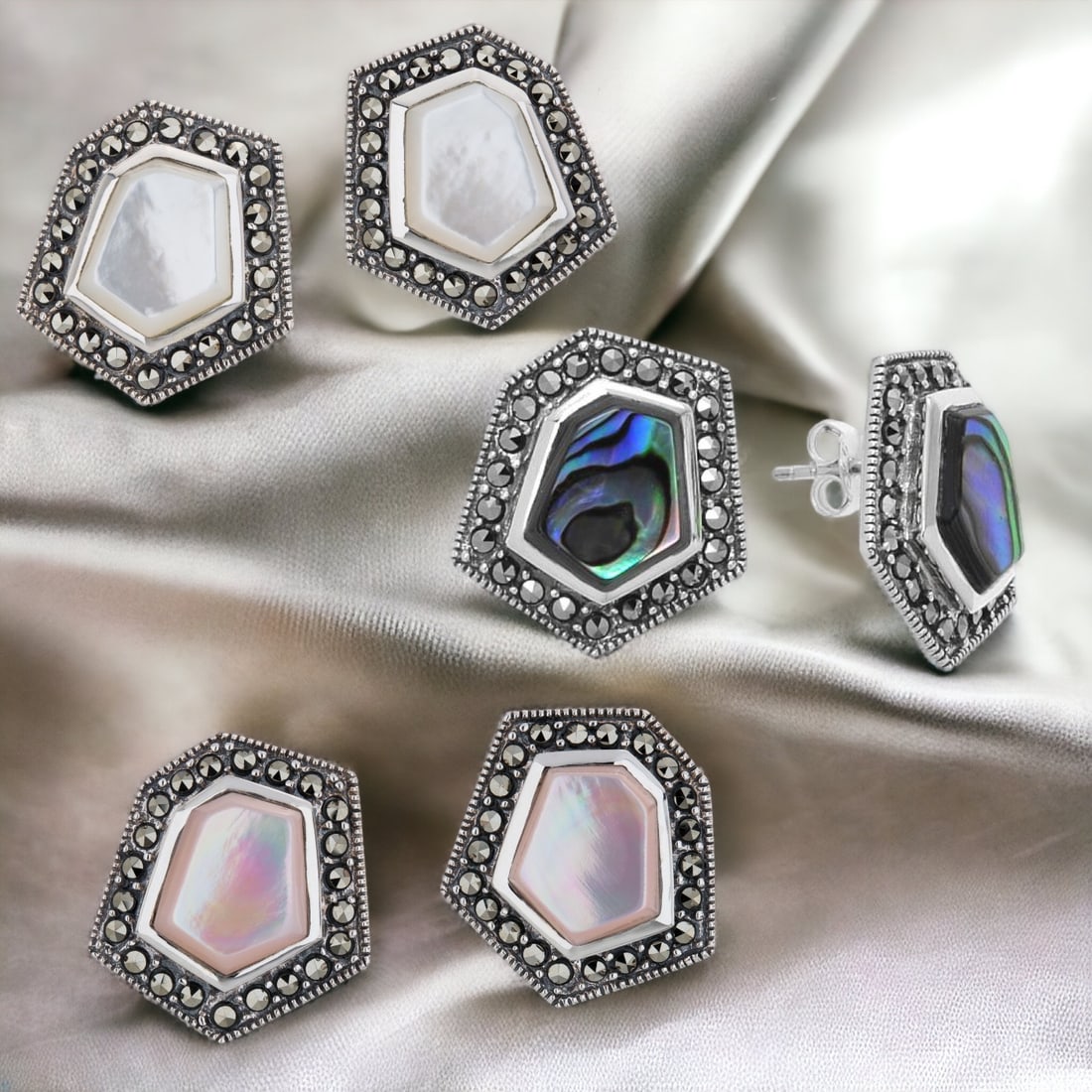 Marcasite & Abalone Sterling Silver Earrings Set: Elevate elegance with our Sterling Silver Earrings featuring Abalone, Pink MOP, and White MOP, all with Marcasite accents and an oxidized finish. This set captivates with iridescence and timeless char