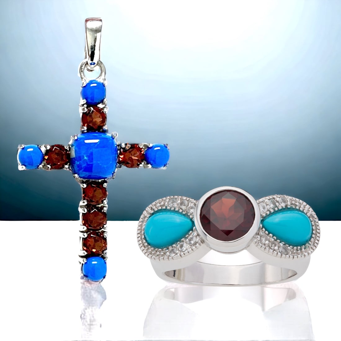 Radiant Turquoise and Garnet Cross Set: Adorn yourself with this radiant set featuring a Sterling Silver Cross pendant embellished with vibrant Turquoise and rich red Garnet gemstones. Complementing this elegant piece is a matching ring, sh