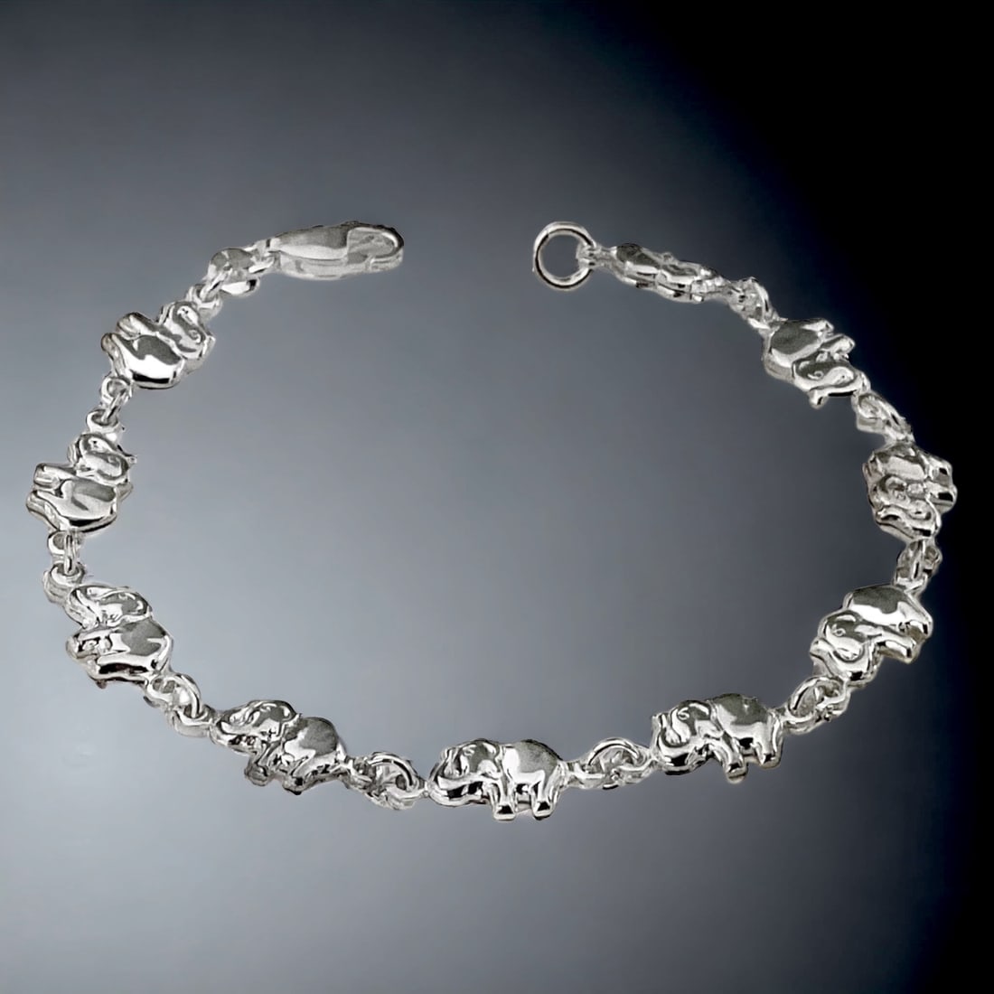 Whimsical Sterling Silver Elephant Bracelet: Embrace a touch of whimsy with our Sterling Silver Elephant Bracelet, sized perfectly at 7 inches. This delightful piece showcases intricately crafted elephants, symbolizing strength and wisdom, adorn