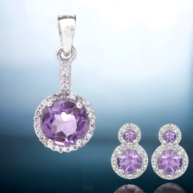 Regal Amethyst Radiance Collection: Adorn yourself with the regal allure of this African Amethyst and White Zircon collection. The sterling silver pendant showcases a captivating African amethyst, beautifully complemented by a sea of sp