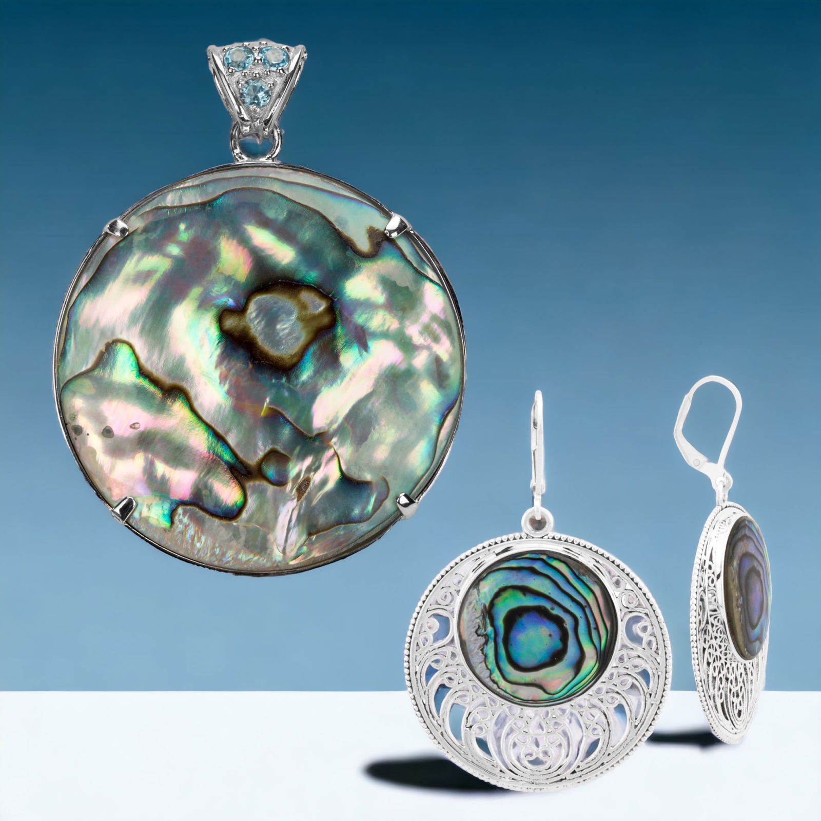 Abalone Earrings & Aventurine Pendant Combo: Amaze your friends with these Sterling Silver Abalone Earrings and Green Aventurine Pendant featuring Abalone and Swiss Blue Topaz. A harmonious blend of iridescence and gemstones