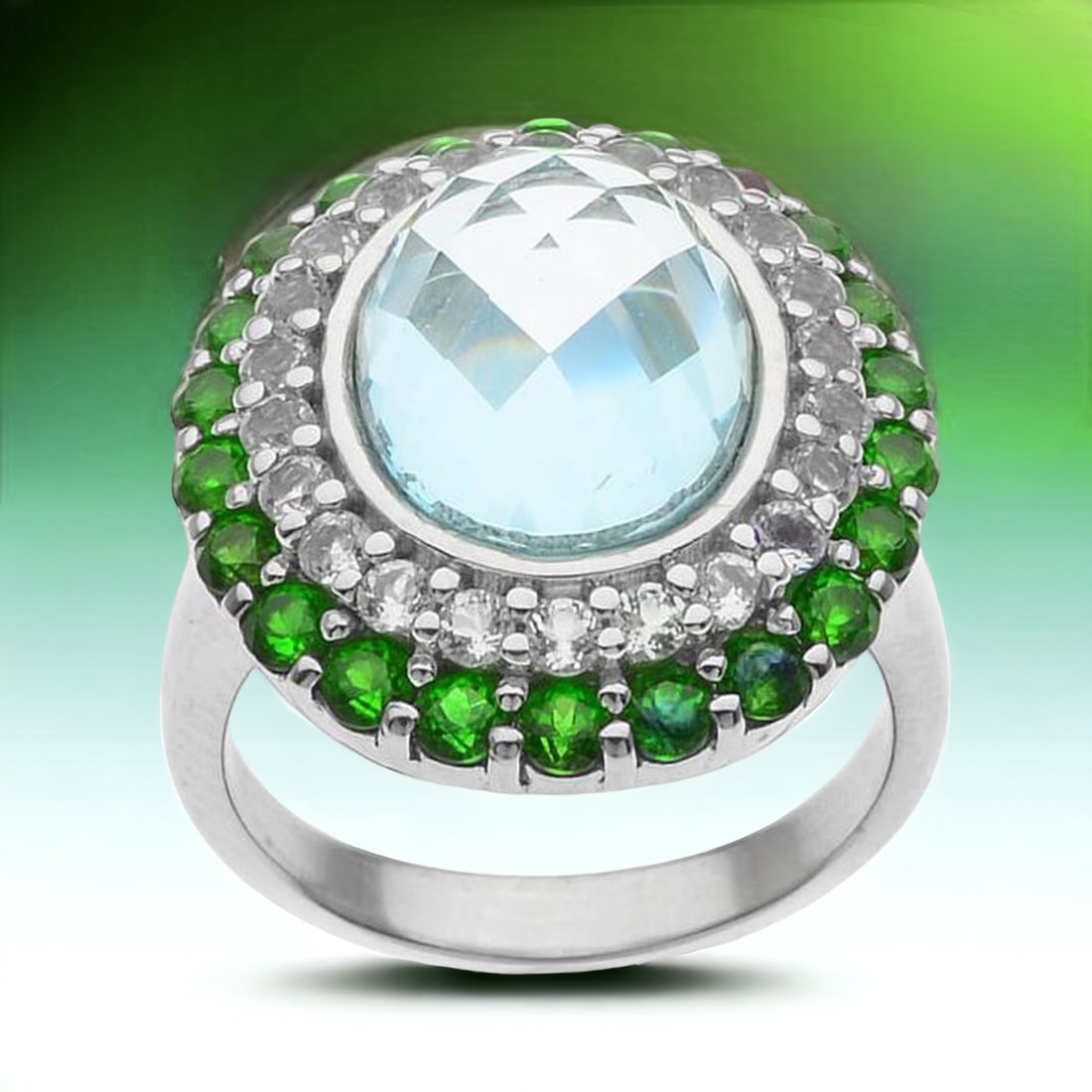Enchanting Ring - Sky Blue Topaz & Chrome diopside: Embrace the enchanting blend of sky blue topaz, white topaz, and chrome diopside in this sterling silver ring, size 8. The fusion of cool azure tones and vibrant green hues creates a captivating symph