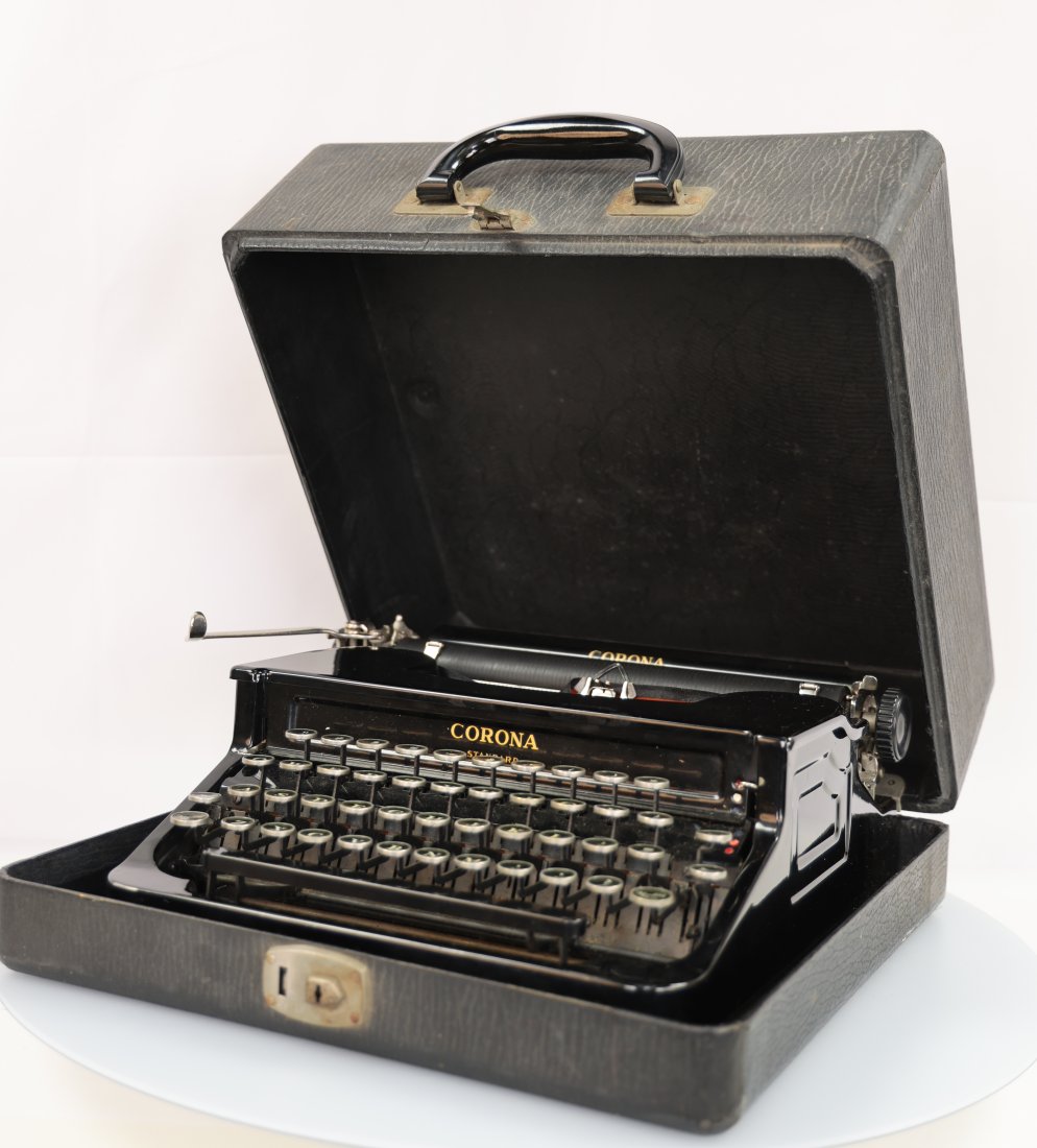 Refurbished Corona Sterling Portable Typewriter: Crafted with precision and attention to detail, the Refurbished Corona Sterling Portable Typewriter boasts a sturdy construction and a beautiful sterling silver finish. Its compact and portable design