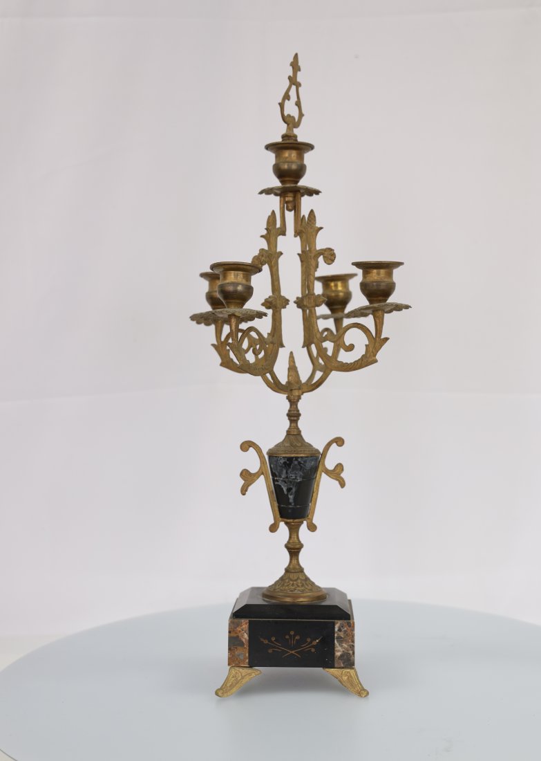 Bronze Black Inlaid Marble & Candelabra Empire: A Bronze black inlaid marble candelabra in the Empire style is a magnificent and luxurious piece that exemplifies the grandeur and elegance of the Empire period. This candelabra combines the beauty of